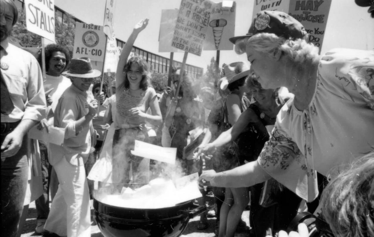 Striking AFSCME Local 101 members burn letters threatening them with termination. (Photo by Lou Dematteis)